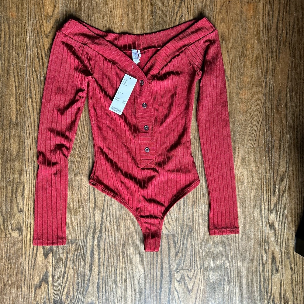Out from under burgundy/wine color top